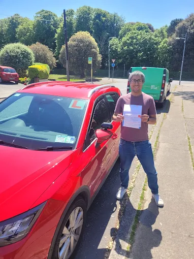 Joaquin celebrating his driving test pass with 1Step Driving School