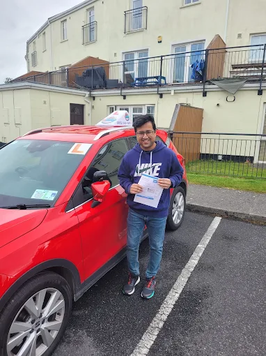 Subo celebrating his driving test pass with 1Step Driving School